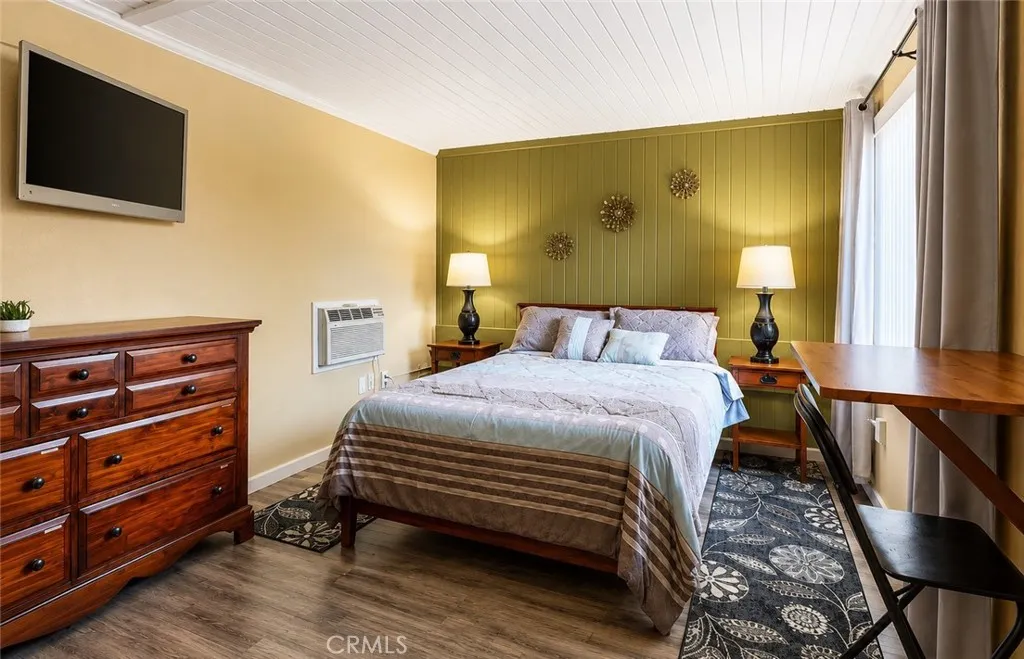 Comfortable private bedroom in Unit #2, completing this independent and versatile living space.