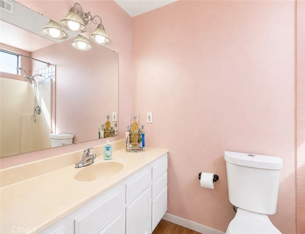 Private bathroom in the third-level primary suite, offering added comfort, convenience, and privacy.