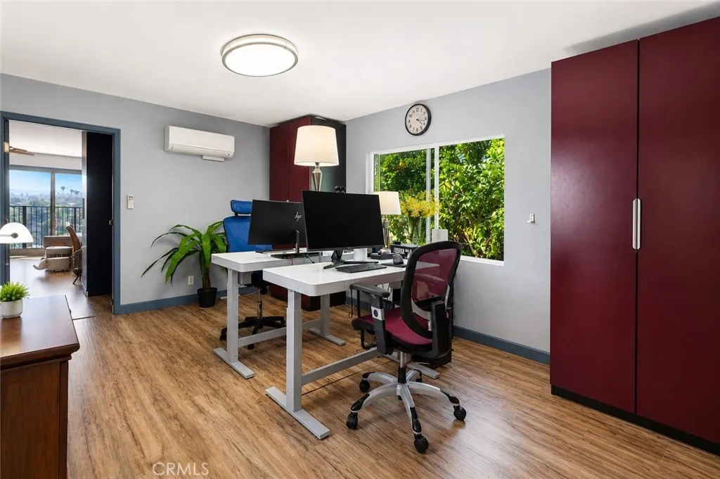 Just off the living room, a versatile bonus room offers the perfect space for a home office or additional bedroom.