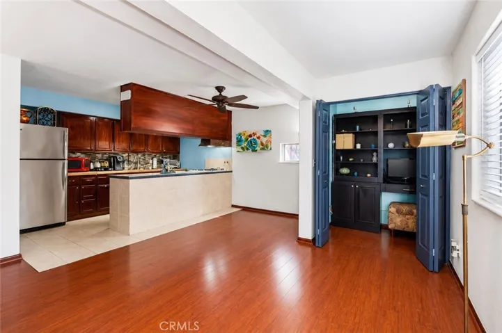Welcome to Unit #1, featuring a living area, kitchen, and flexible office space—ideal for multi-generational living or potential short-term rental income.