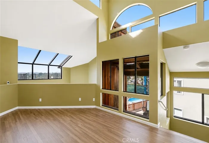Welcome to the third level, featuring 3 bedrooms, 2 bathrooms, and a versatile bonus area—perfect for a family room, lounge, or flexible space to make your own.