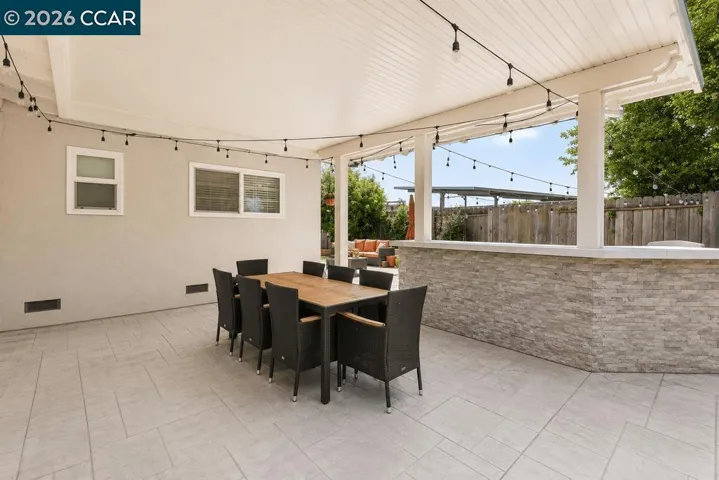 Photo taken prior to patio being powerwashed. Patio has been powerwashed. See original photo at end.