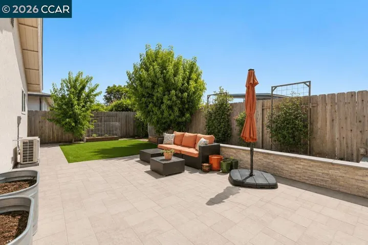 Photo taken prior to patio being powerwashed. Patio has been powerwashed. See original photo at end.