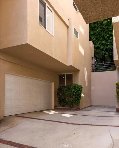 2 car garage with large storage closet