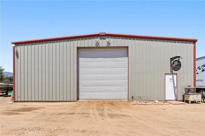 50 x 75 metal shop with electrical, office with AC and bathroom.