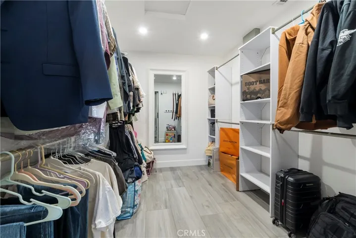 Primary walk-in closet.