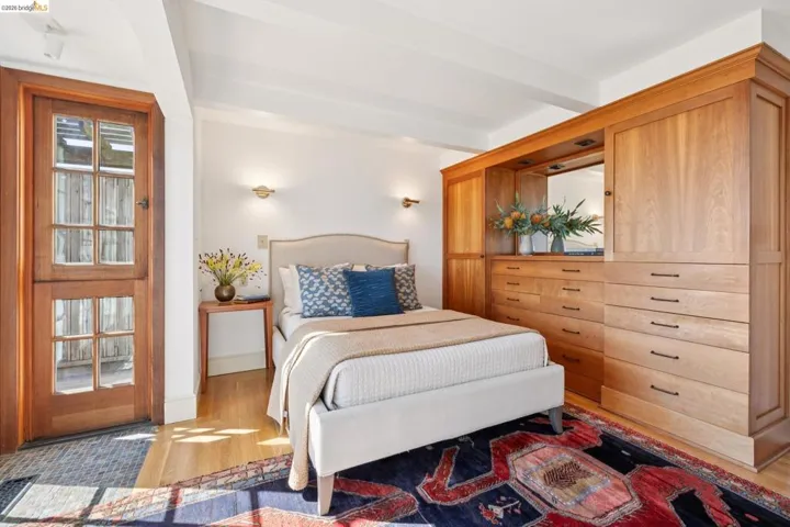Room featuring light wood-finish flooring and white walls