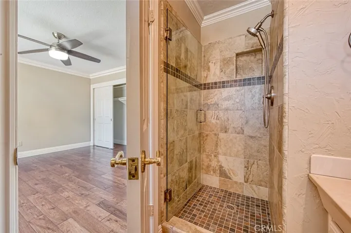 2nd primary bedroom and en-suite bathroom with walk-in shower,