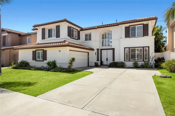 Front Entrance with a Large Driveway
