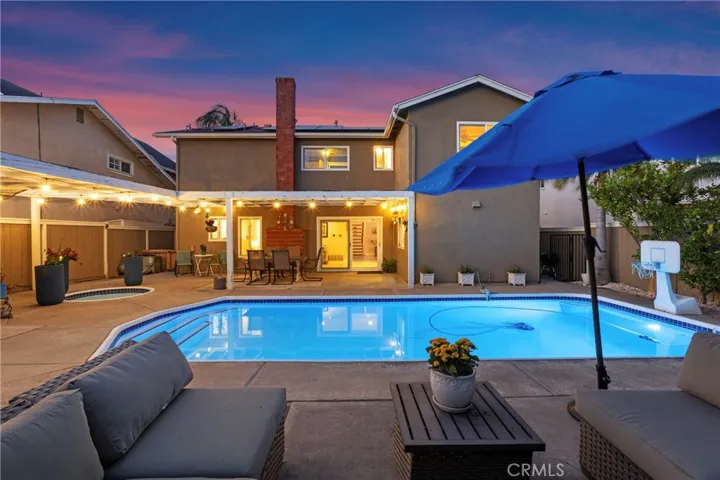 View of pool and back of home.