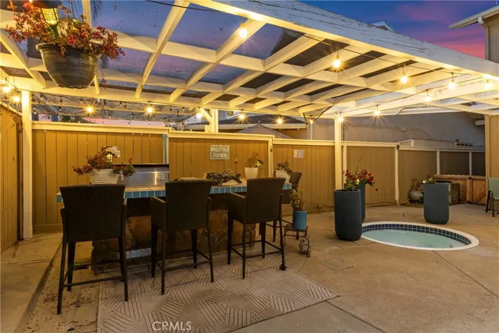 Outdoor living space, swimming poo, spa, and BBQ island