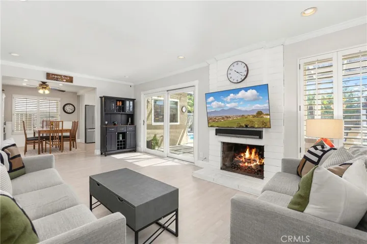 Family room with direct access to backyard and views of swimming pool
