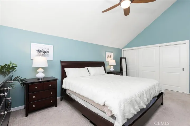 Master bedroom with high ceiling and private master bathroom