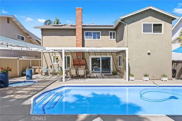 Outdoor living space, swimming poo, spa, and BBQ island
