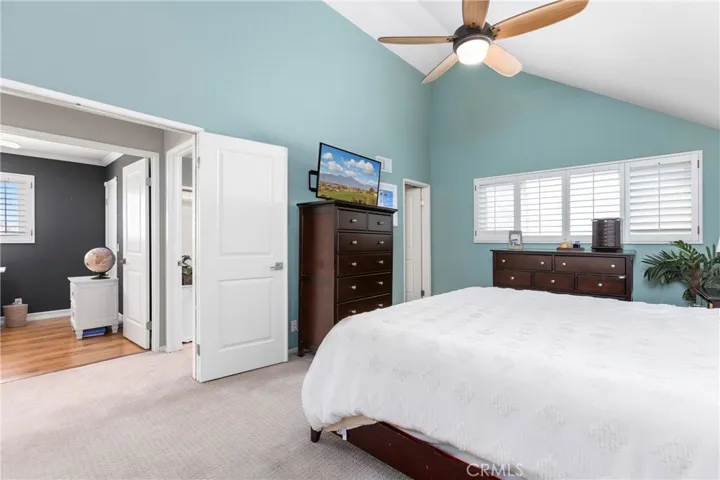 Master bedroom with high ceiling and private master bathroom