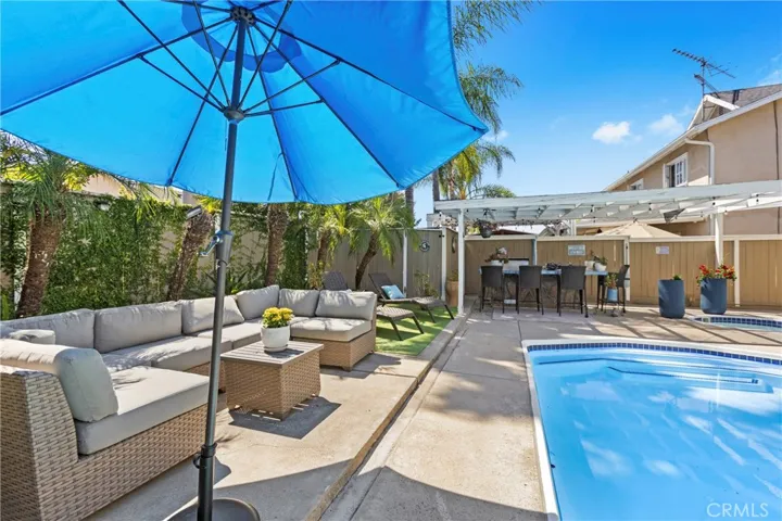 Outdoor living space, swimming poo, spa, and BBQ island