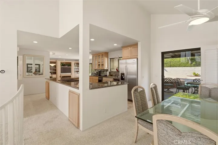Dining room looking towards kitchen pool and family room