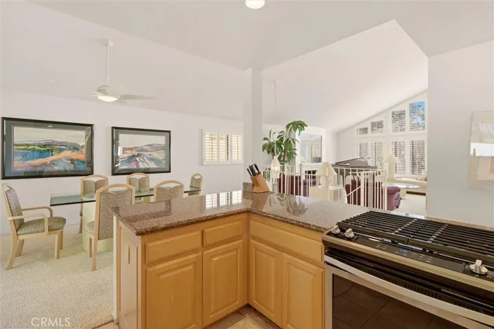 kitchen facing living room and dining room