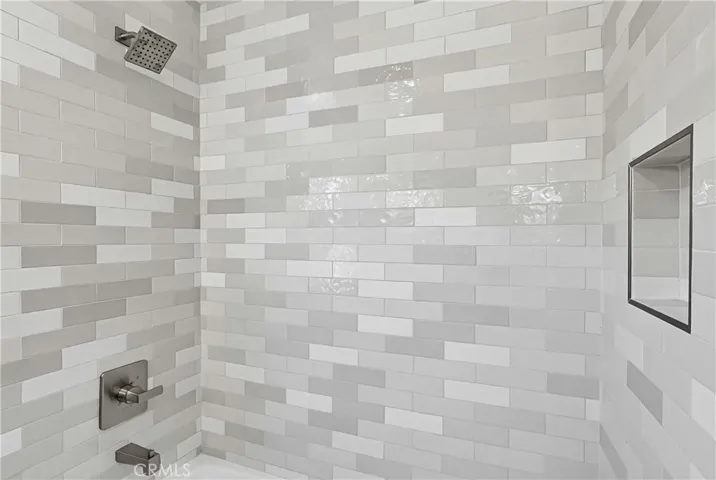 Hall bath with custom tile surround