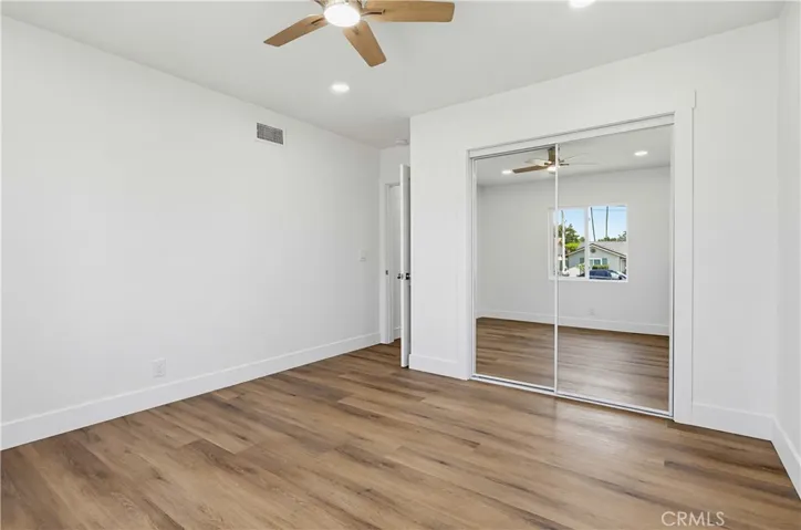 Bedroom 2 with full length mirror closet