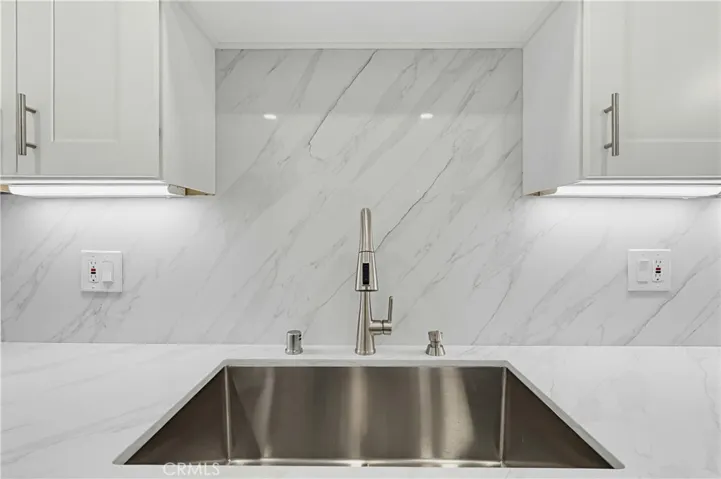 Large SS single bay sink with full backsplash