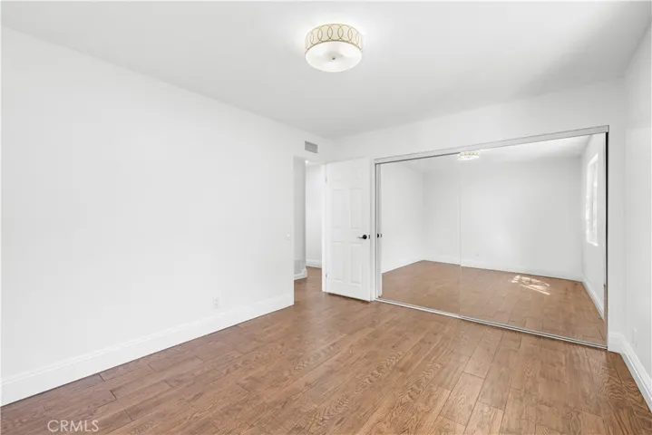 Bedroom #3 with  9' closet and mirrored doors.