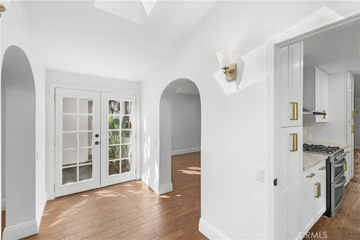 View in foyer looking back towards secondary entry doors.