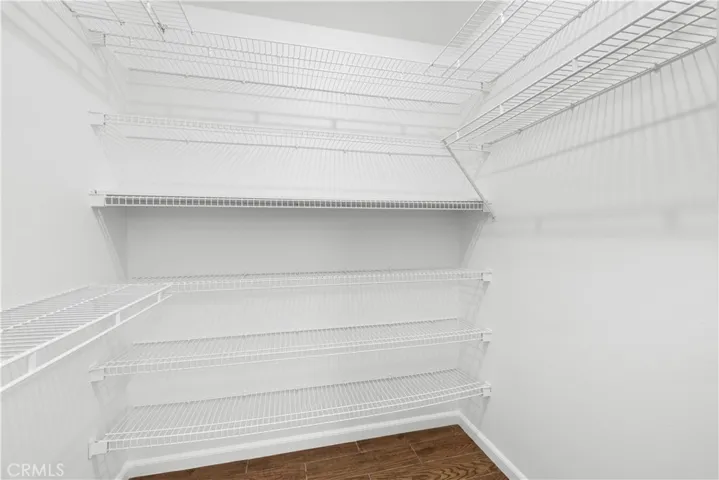 Bedroom #2 walk-in closet with automatic light.