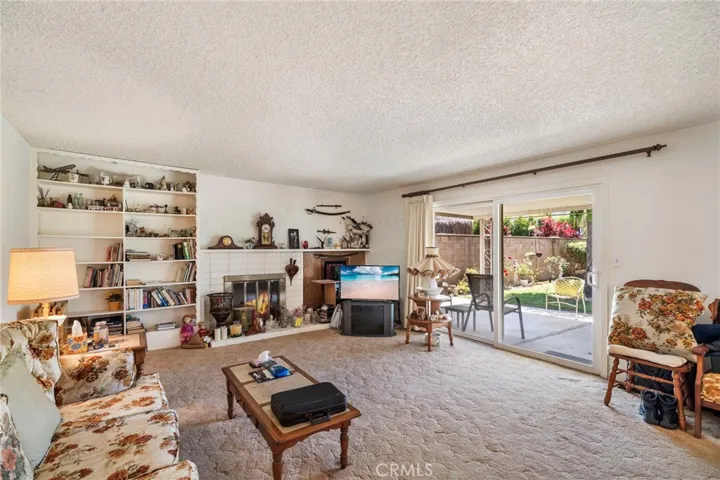 Spacious living room with cozy fireplace