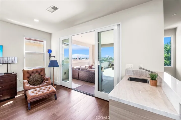 Built-in countertop, with refrigerator and sink, perfect kitchenette or coffee bar.