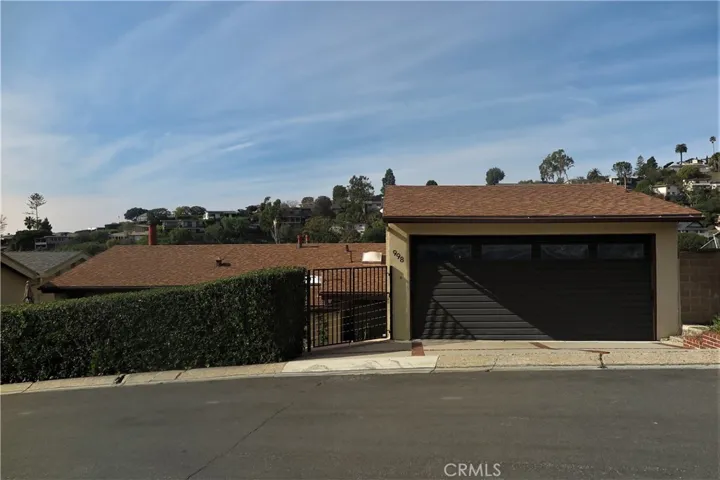 Street level garage, 1 flight of stairs down to the house