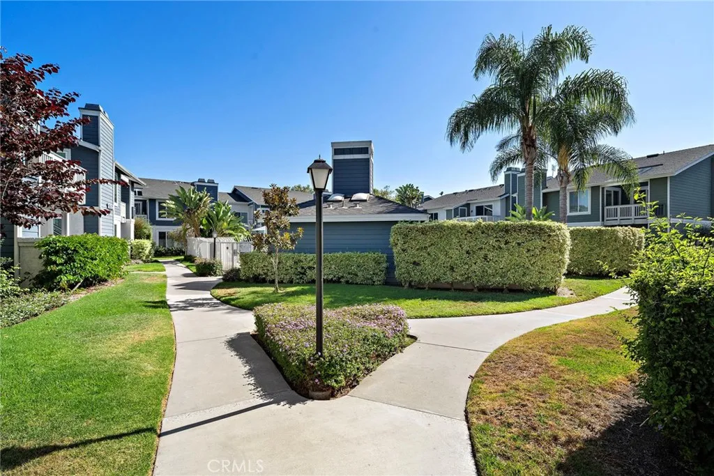 Community: Beautifully landscaped grounds with mature trees, greenbelts, and scenic walking paths throughout the community.
