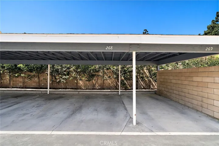 Carport: 1 Assigned covered carport parking with convenient access to the home.