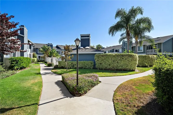 Community: Beautifully landscaped grounds with mature trees, greenbelts, and scenic walking paths throughout the community.