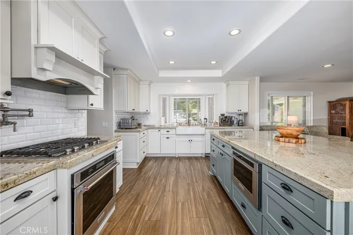 Gourmet Kitchen with Granite Counters and Farm Sink