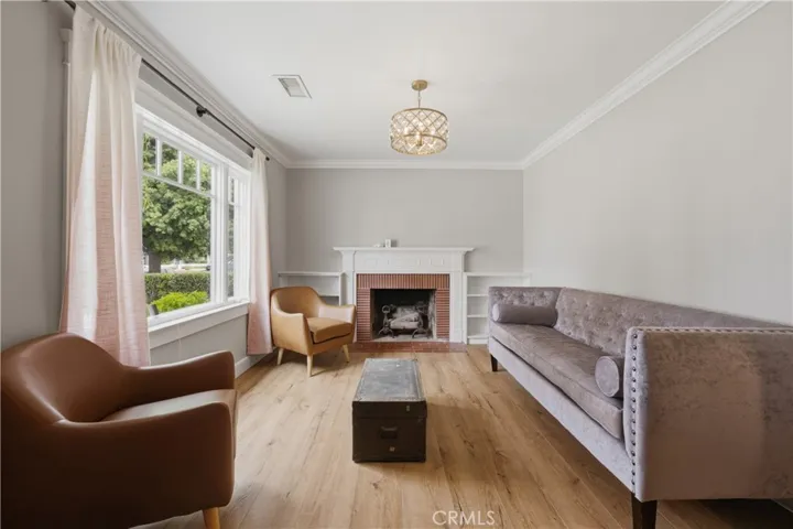 Front Living Area with Gas Fireplace and Large Picture Window!