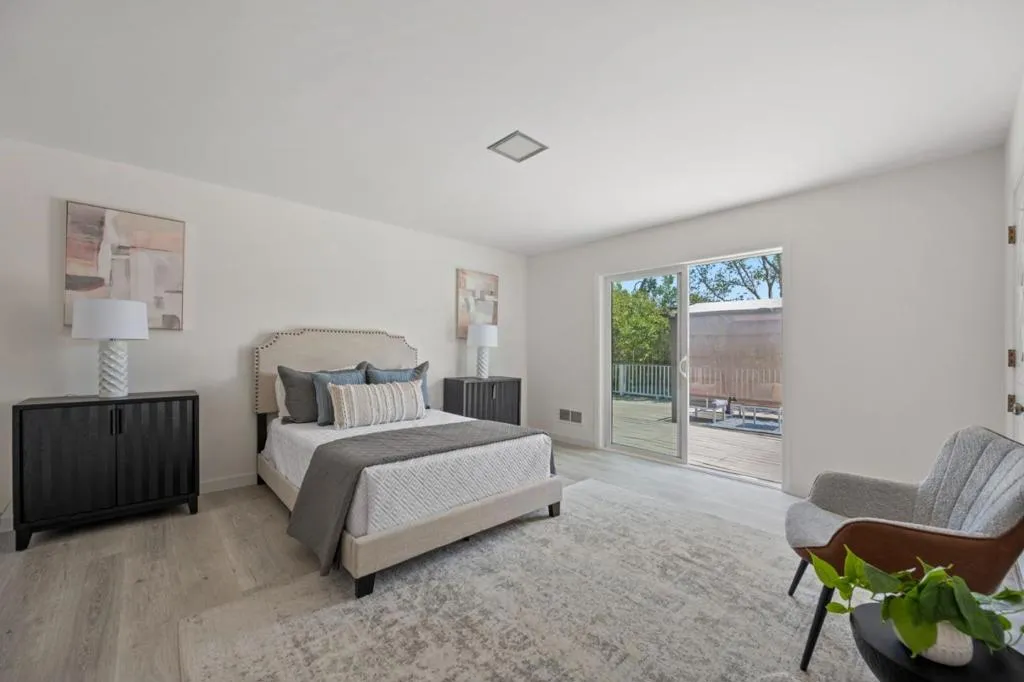 4th Bedroom with new Flooring & Access to Patio & Pool