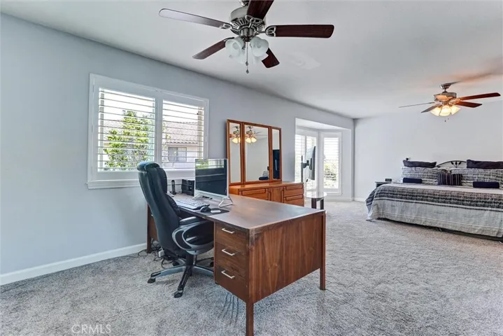 Another view of primary bedroom.
