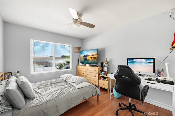 Additional spacious bedroom with ceiling fan