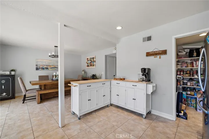 Two movable islands with additional cabinet storage