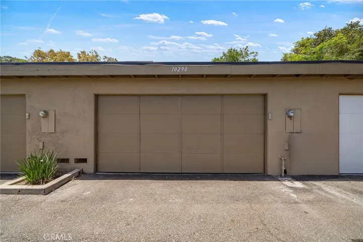 Two car garage with direct access through back patio