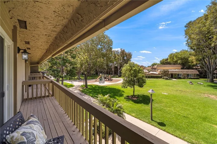 Balcony overlooking lush greenbelt