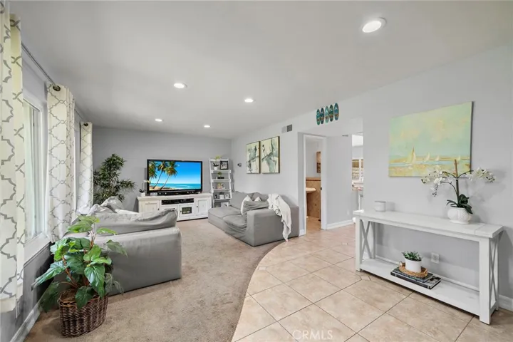 Spacious living room over looking beautiful greenbelt