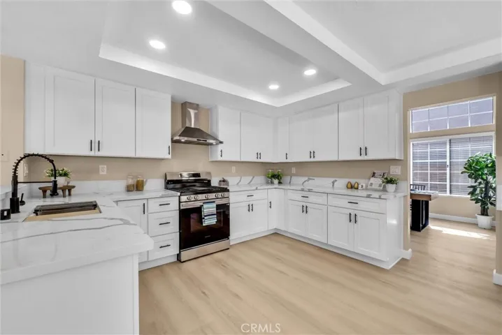 Remodeled kitchen with lots of counter spaces and storage