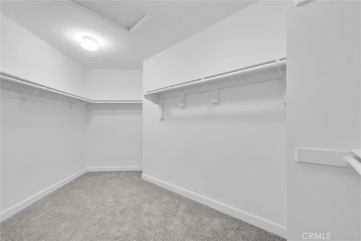 Large walk-in-closet in the primary bedroom