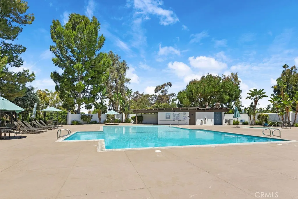 The community pool is an easy stroll out your back gate...