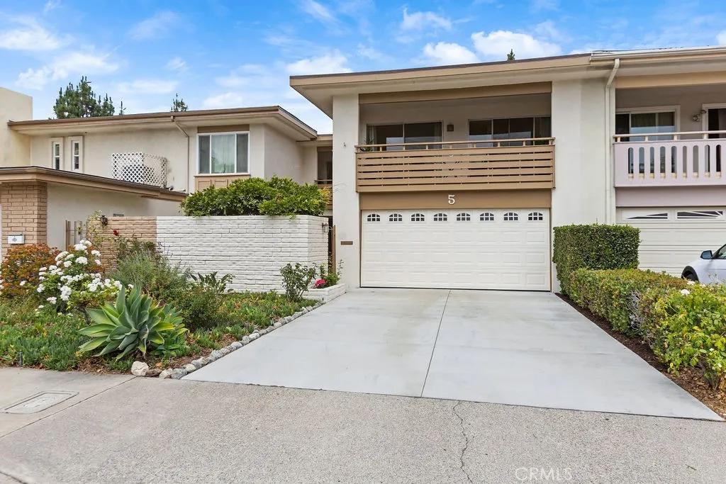 New driveway (2025) - longer driveway to accommodate additional off-street parking.  Two car attached garage with storage and direct access.