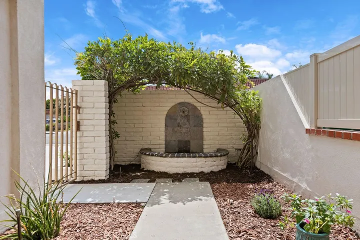 Water fountain at entry to courtyard adds to the relaxing vibe...