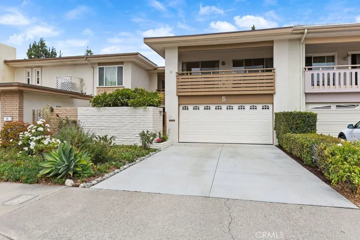 New driveway (2025) - longer driveway to accommodate additional off-street parking.  Two car attached garage with storage and direct access.