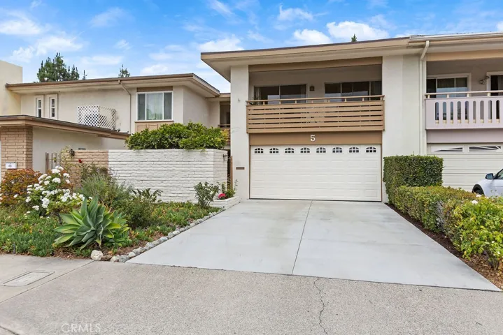 New driveway (2025) - longer driveway to accommodate additional off-street parking.  Two car attached garage with storage and direct access.
